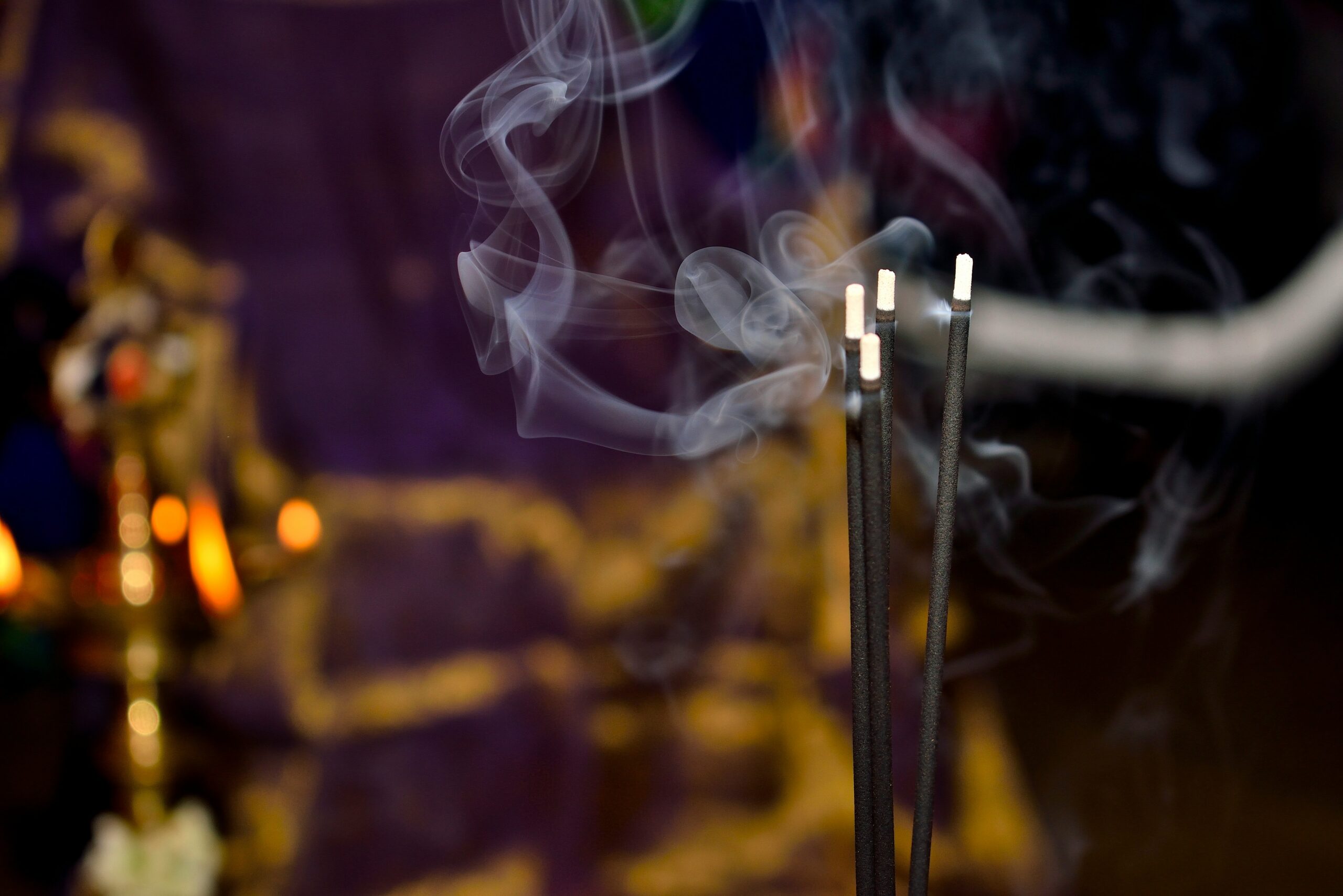 shallow focus photography of incense